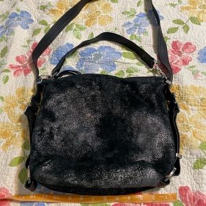 Rough & Tumble black medium hoop hobo in graphite.